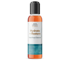 Sun Coast Sciences Hydrate + Restore cleanser bottle with creamy lather for daily cleansing.