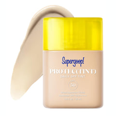 Supergoop Protec(tint) SPF 50 bottle closeup shows compact packaging and protection
