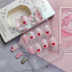 Sutaozhi Valentines nails displaying red heart detail for festive looks