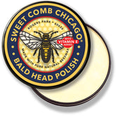 Sweet Comb Chicago bald head polish bottle with natural beeswax for post-shave conditioning.