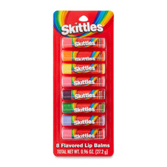 Taste Beauty Skittle lip balms close-up showing colorful tips and glossy finish.