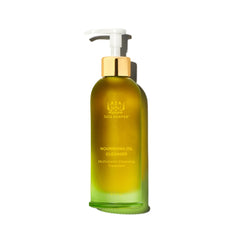 Tata Harper Nourishing Oil Cleanser bottle on vanity ready to remove makeup gently while nourishing skin