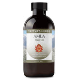 Tattva's Herbs Amla Oil bottle for premium scalp care and shine.