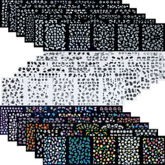 Tazimi flowers nail stickers in black on nails for chic, quick color pop.