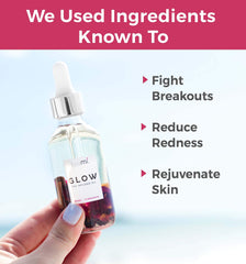 Teami Glow dropper applying 3-4 drops onto skin