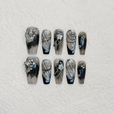 TENPAL gothic black French tips coffin kit shown for dramatic, reusable nail fashion.