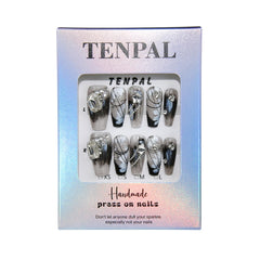 TENPAL oriental chain crystal nails highlight luxurious embellishment for evenings.