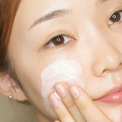 Applying THANKYOU FARMER Sun Project Light Sun Essence in a daily routine.