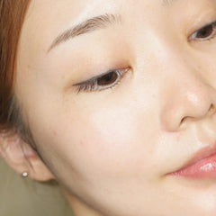 THANKYOU FARMER Sun Project Light Sun Essence used as makeup base for a dewy look.