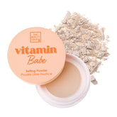 The Beauty Crop Vitamin Babe Setting Powder bottle for long-lasting wear.