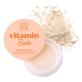 The Beauty Crop Vitamin Babe Setting Powder with puff for on-the-go touch-ups.