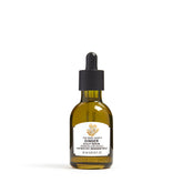 The Body Shop Ginger Scalp Serum bottle close-up for nourishing scalp care