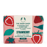 The Body Shop Strawberry Cleansing Bar packaging shown, highlighting vegan formula and responsible sourcing.