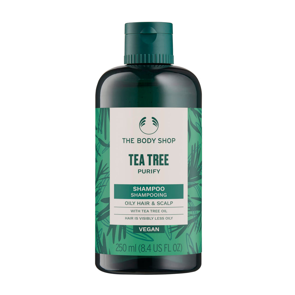 The Body Shop Tea Tree Purifying and Balancing Shampoo bottle for oily hair and scalp.