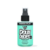 The Doux Drops Bonding Polish Spray being applied for silky frizz-resistant finish during styling