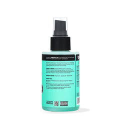 The Doux Drops Bonding Polish Spray bottle closeup shows glossy shine and premium design