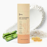 The Earthling Co. dry shampoo bottle refreshing oily roots with a clean, lightweight boost.