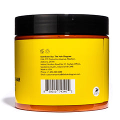 Close-up texture of Ashley Marie Moisture Control Curl Cream for smooth, frizz-free curls.