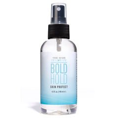 The Hair Diagram Bold Hold Protect spray on skin creates a protective barrier for wig wear