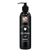 The Henna Guys pre shave oil sandalwood bottle pour improves glide and shaving comfort.