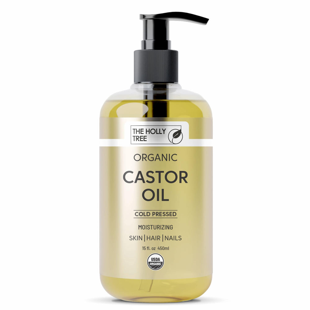 The Holly Tree Organic Castor Oil bottle pour showing pure, versatile oil for skin and hair