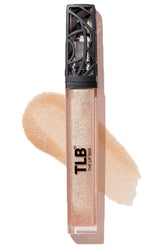 The Lip Bar Trophy Wife gloss bottle showcases champagne shimmer for a high-gloss finish.