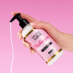 The Mane Attraction Moisturizing Conditioner bottle back displays ingredient list and nourishing formula