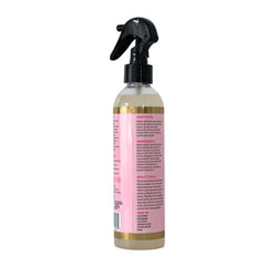 The Mane Attraction Nourishing Daily Hair Growth Moisture Mist long hair display with glossy strands.