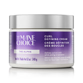 The Mane Choice Alpha Curly Cream bottle close-up showing curl definition.
