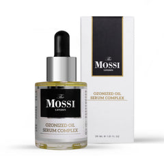 The Mossi London ozonized oil serum bottle close-up for post-transplant scalp care.