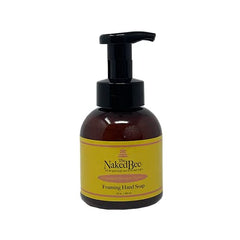 The Naked Bee Grapefruit Blossom Honey foam bottle closeup highlights gentle cleansing and hydrating lather.