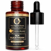 The Organic Forest Sea Buckthorn Oil bottle pour for radiant facial skin