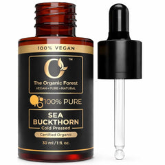 The Organic Forest Sea Buckthorn Oil bottle pour for radiant facial skin