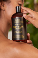 Pouring The Roots Naturelle Chocolate Bliss Body Wash creates a rich lather for gentle cleansing.