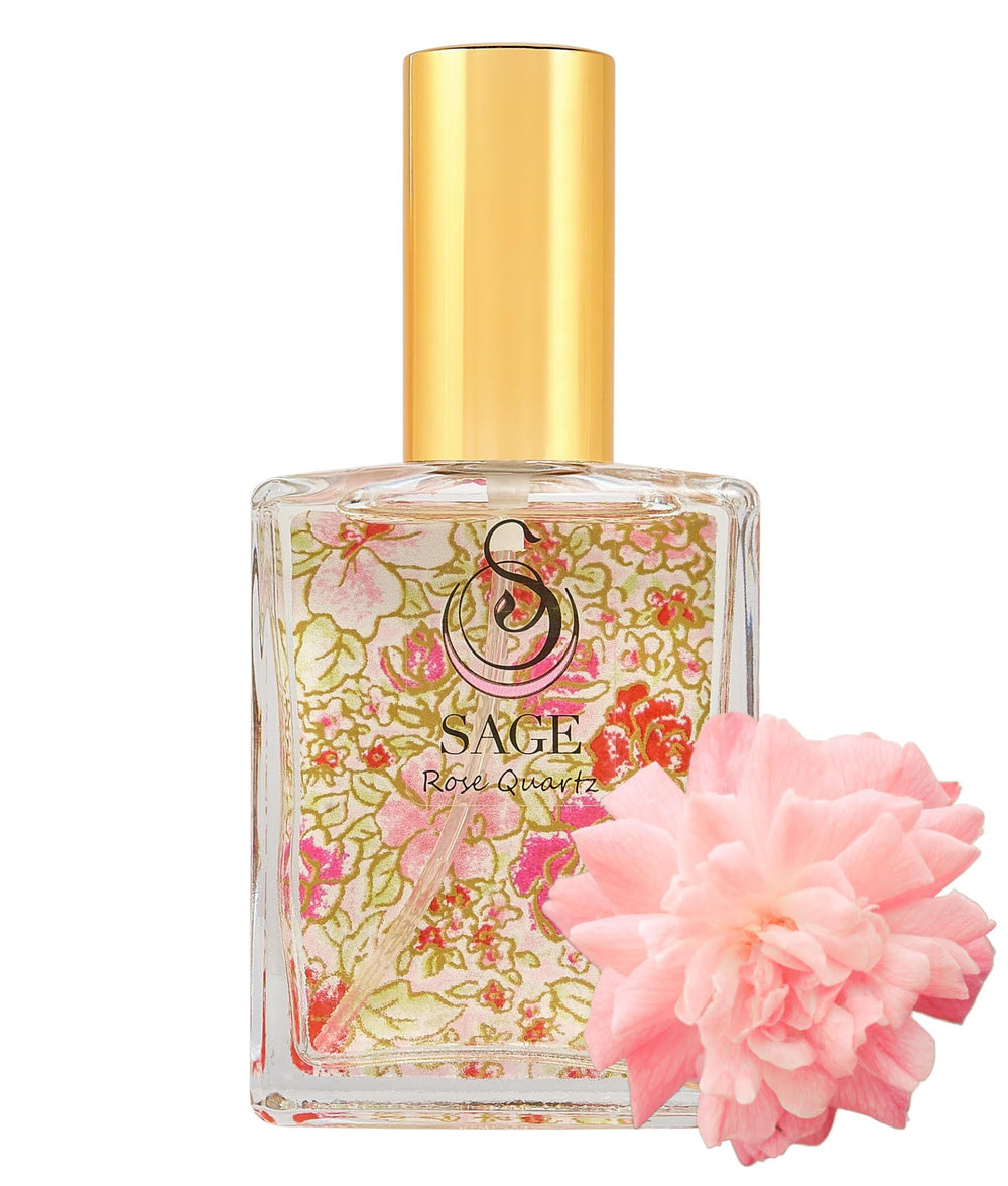 The Sage Lifestyle Rose Quartz spray bottle, a portable luxury fragrance for on-the-go wear.