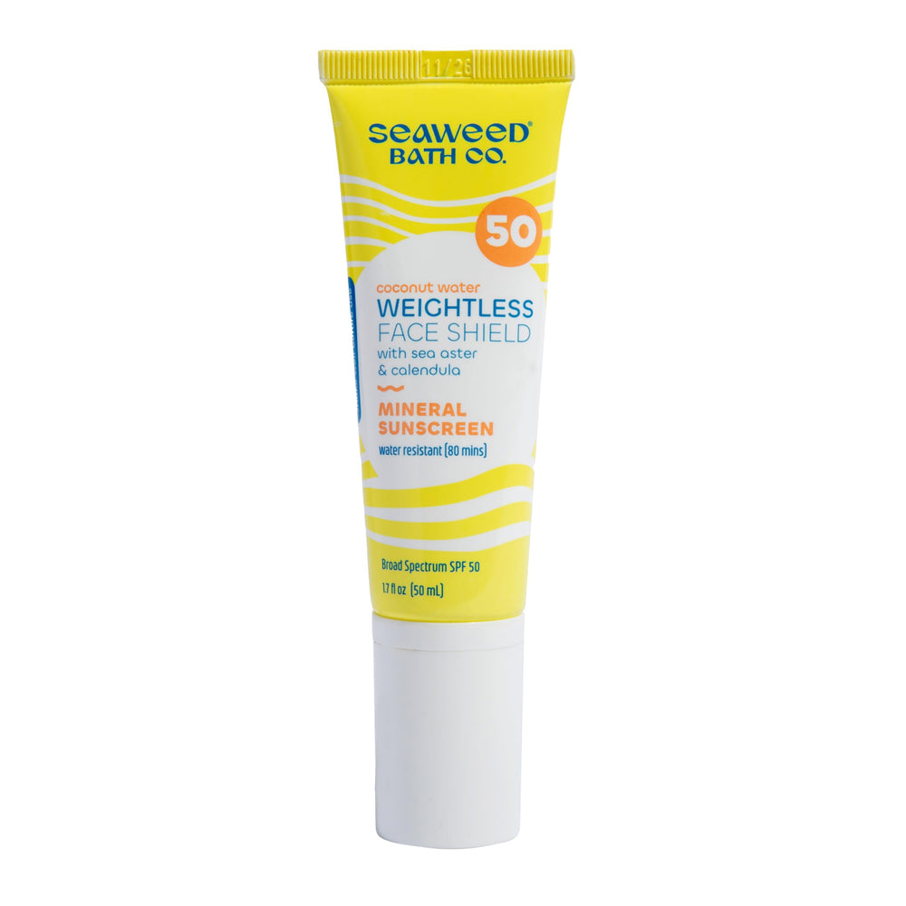 The Seaweed Bath Co. Weightless Face Shield bottle pour for effortless sun protection and hydration.