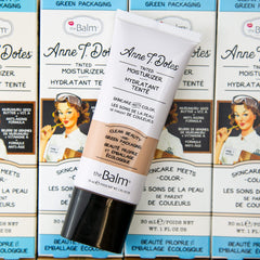 theBalm Anne T Dotes tinted moisturizer applied with fingers for natural, lightweight coverage.