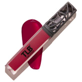The Lip Bar Rich Auntie Deep Berry swatch showcases bold pigment for a statement lip.