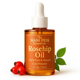 The Mani Pedi Essentials Rosehip Oil bottle close-up for deep hydration.