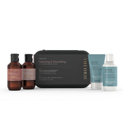 Theorie Exfoliating Scrub jar offering gentle exfoliation for smoother skin.
