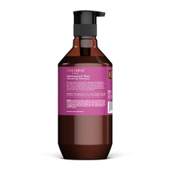 Theorie Sage Helichrysum Plum shampoo label closeup showing color-safe, keratin-friendly formula.