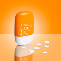 Thinkdaily sunscreen enriched with jojoba oil and vitamin E for nourishment.