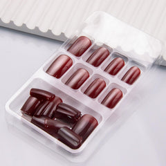 Thuoxde red glossy nails close-up with vibrant shine