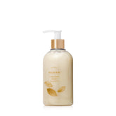 Thymes Goldleaf hand wash bottle with pump, delivering rich cleansing and hydration.