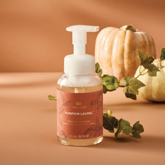 Thymes Pumpkin Laurel scent bottle with warm fall aroma in kitchen or bath.