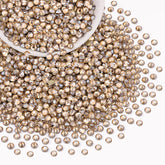 TINKRSTUFF 2000Pcs SS20 rhinestones in Golden Shadow for dazzling crafts and nail art projects.