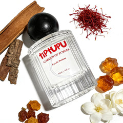 tiptupu amberwood ambergris heart emphasizes warm, resinous depth for evening wear.