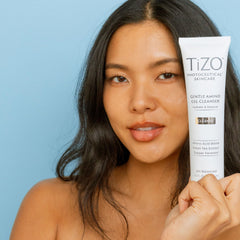 TiZO Gentle Amino Gel Cleanser texture close-up with creamy lather for sensitive skin.