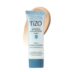 TiZO Mineral Sun Defense tinted bottle for daily SPF 50 protection with sheer coverage.