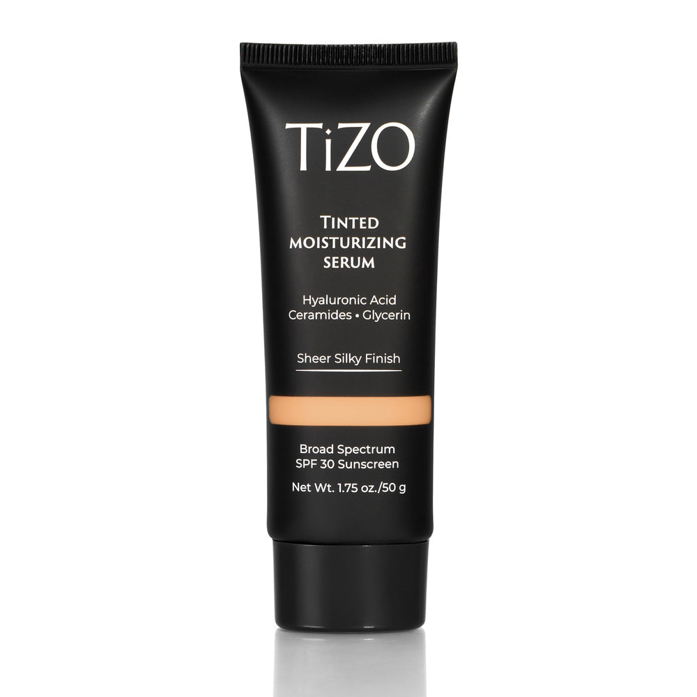 TIZO tinted moisturizing serum bottle highlighting SPF 30 protection on skin